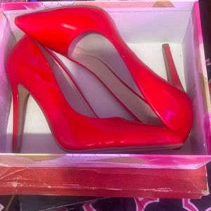 Red glossy heels